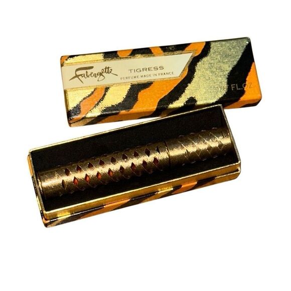 VINTAGE FABERGE FABERGETTE TIGRESS ROLL ON PERFUME 1/8 oz IN GOLDEN CASE FULL - Picture 4 of 10